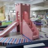 Pink soft play castle with slide